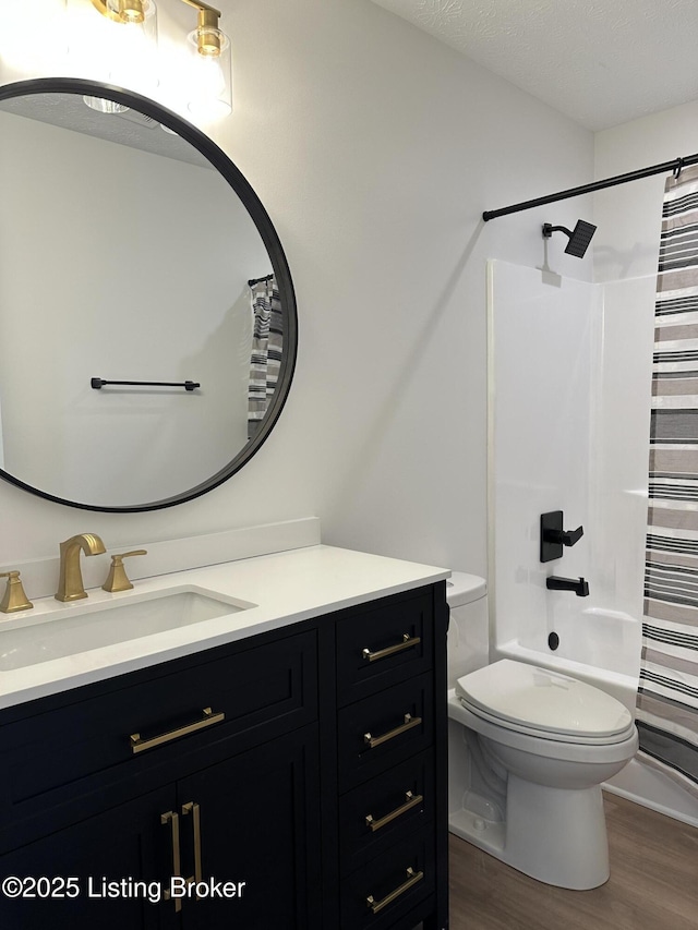 1129 Willow Oak Ln, La Grange, KY 40031 - bathroom featuring wood finished floors, vanity, toilet, and shower / tub combo
