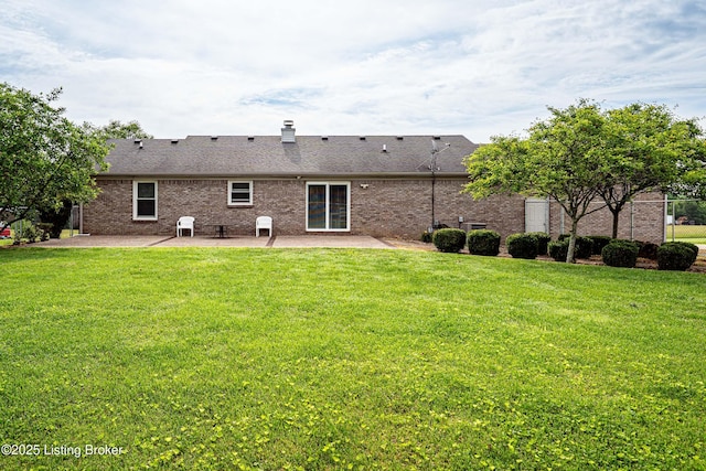 171 Williams Ct, Brooks, KY 40109 - rear view of property with a patio, a yard, brick siding, and a chimney