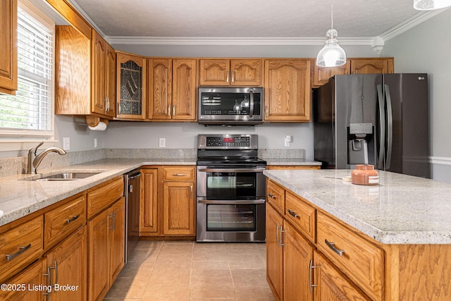 171 Williams Ct, Brooks, KY 40109 - kitchen featuring stainless steel appliances, a sink, brown cabinets, light stone countertops, and ornamental molding