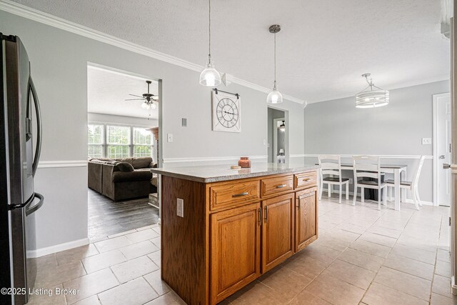 171 Williams Ct, Brooks, KY 40109 - kitchen with stainless steel fridge with ice dispenser, a ceiling fan, a textured ceiling, light tile patterned floors, and crown molding