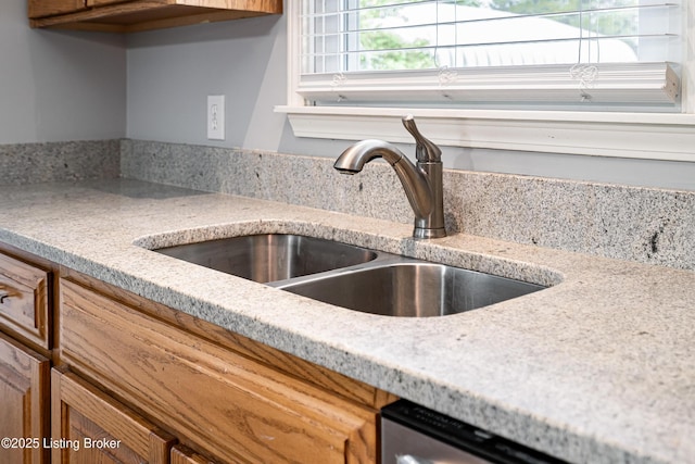 171 Williams Ct, Brooks, KY 40109 - kitchen view of a sink, brown cabinetry, and stainless steel dishwasher
