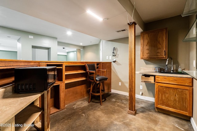 171 Williams Ct, Brooks, KY 40109 - indoor bar featuring black microwave, unfinished concrete flooring, and baseboards