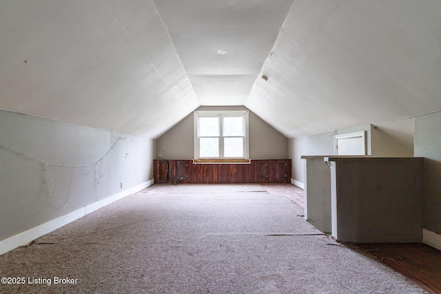 1119 Carlisle Ave, Louisville, KY 40215 - additional living space featuring vaulted ceiling, carpet floors, and baseboards