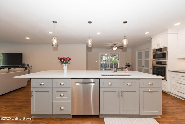 2401 Branning Rd, Thornhill, KY 40222 - kitchen featuring stainless steel appliances, open floor plan, a sink, ornamental molding, and a ceiling fan