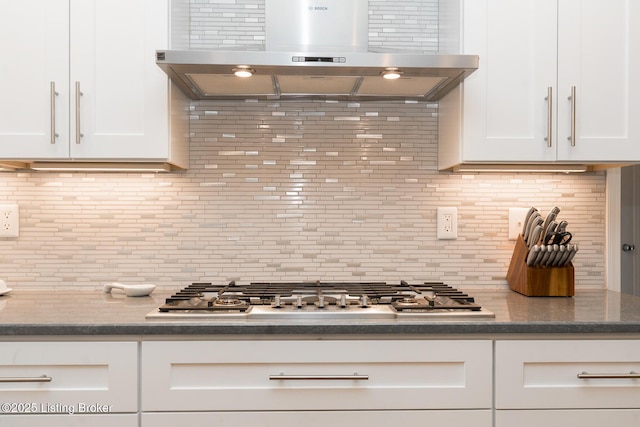 2401 Branning Rd, Thornhill, KY 40222 - kitchen featuring island range hood, stainless steel gas cooktop, decorative backsplash, and white cabinets