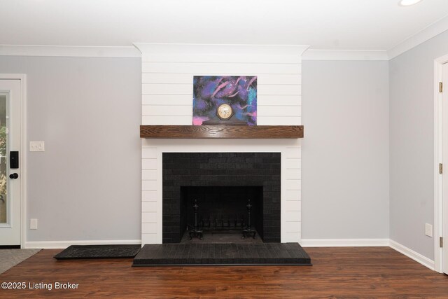 2401 Branning Rd, Thornhill, KY 40222 - detailed view of crown molding, wood finished floors, baseboards, and a brick fireplace