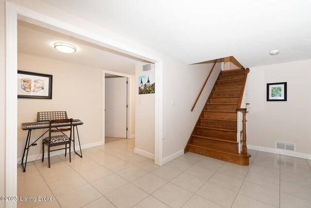 2401 Branning Rd, Thornhill, KY 40222 - staircase featuring tile patterned floors and baseboards