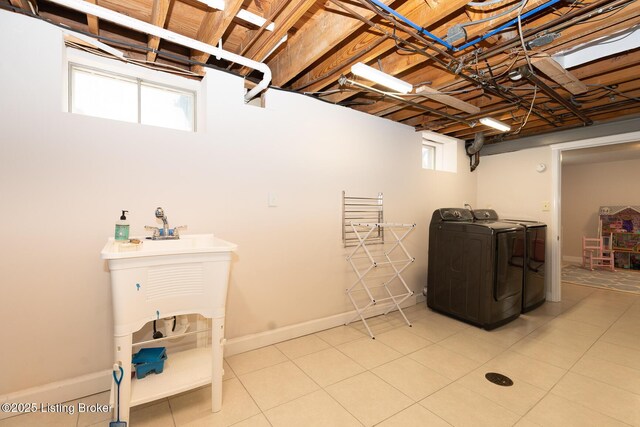 2401 Branning Rd, Thornhill, KY 40222 - basement with independent washer and dryer, light tile patterned floors, and baseboards