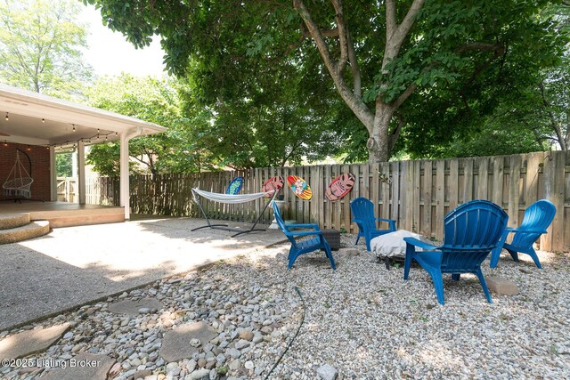 2401 Branning Rd, Thornhill, KY 40222 - fenced backyard featuring a patio
