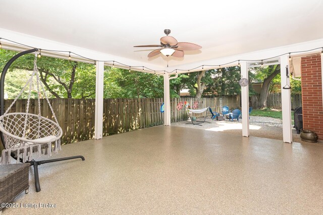 2401 Branning Rd, Thornhill, KY 40222 - fenced backyard with a patio area and ceiling fan