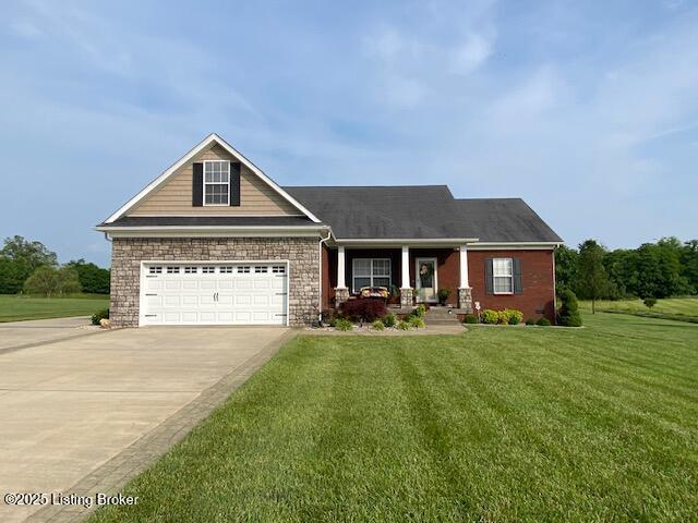 1013 Mallards Cv, Bardstown, KY 40004 - view of front of house with a porch, driveway, and a front yard