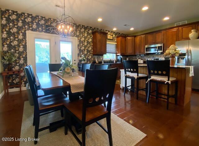 1013 Mallards Cv, Bardstown, KY 40004 - dining area featuring a chandelier, dark wood-style floors, recessed lighting, baseboards, and wallpapered walls