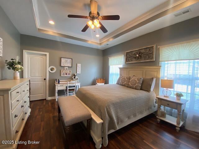 1013 Mallards Cv, Bardstown, KY 40004 - bedroom featuring a raised ceiling, dark wood finished floors, recessed lighting, a ceiling fan, and crown molding