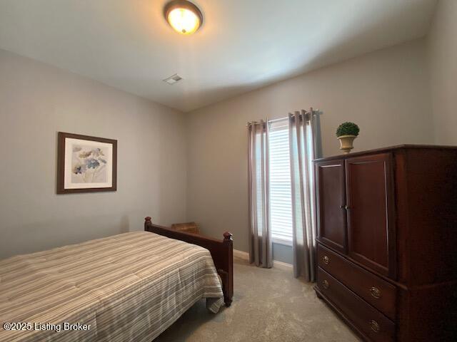 1013 Mallards Cv, Bardstown, KY 40004 - bedroom featuring light carpet and baseboards