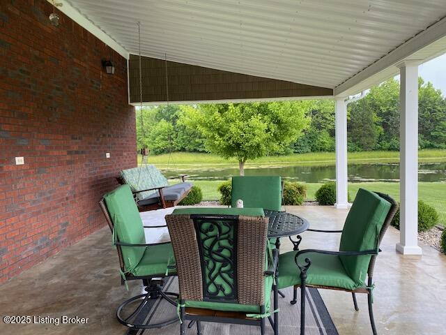 1013 Mallards Cv, Bardstown, KY 40004 - view of patio / terrace with a water view and outdoor dining area