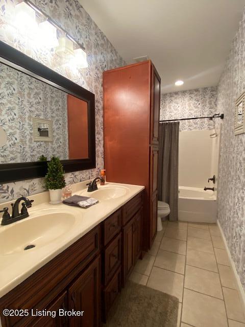 1013 Mallards Cv, Bardstown, KY 40004 - full bath with wallpapered walls, toilet, shower / tub combo, double vanity, and tile patterned floors