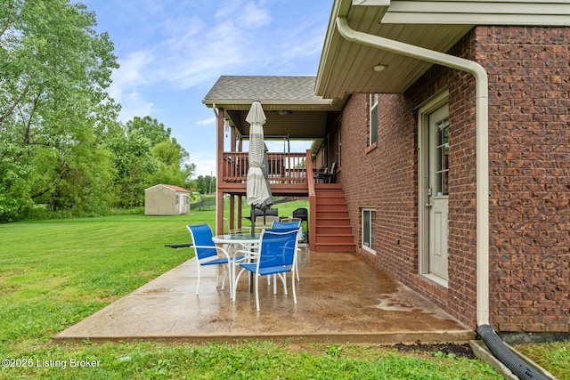 90 Chancellor Ct, Elizabethtown, KY 42701 - view of patio featuring stairs, a wooden deck, and outdoor dining area