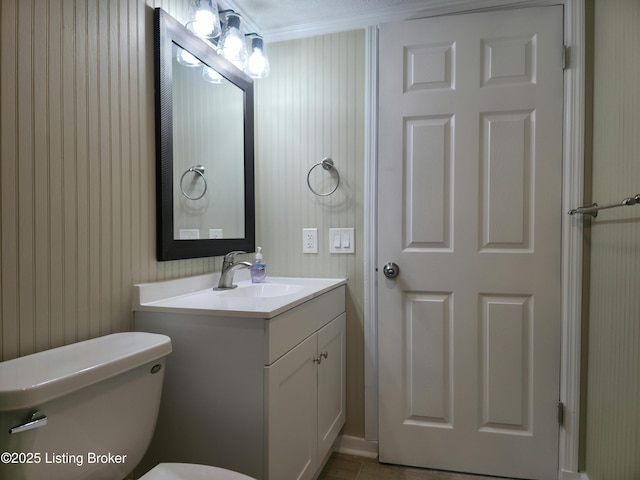 7125 Sky Blue Ave, Louisville, KY 40258 - bathroom with vanity, toilet, and crown molding