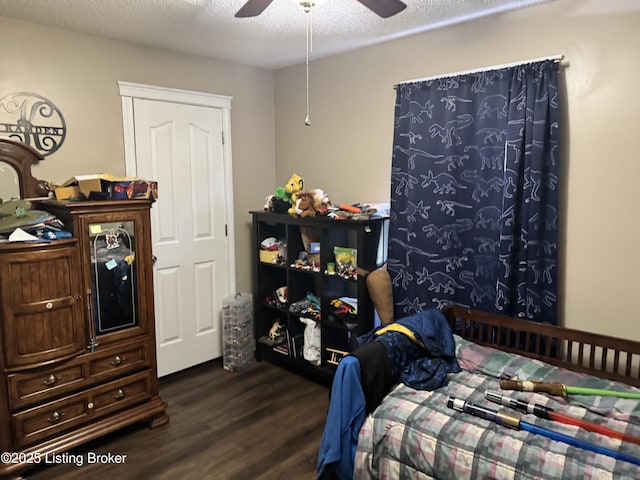 1103 Foxfire Rd, Bardstown, KY 40004 - bedroom featuring dark wood-style floors, ceiling fan, and a textured ceiling