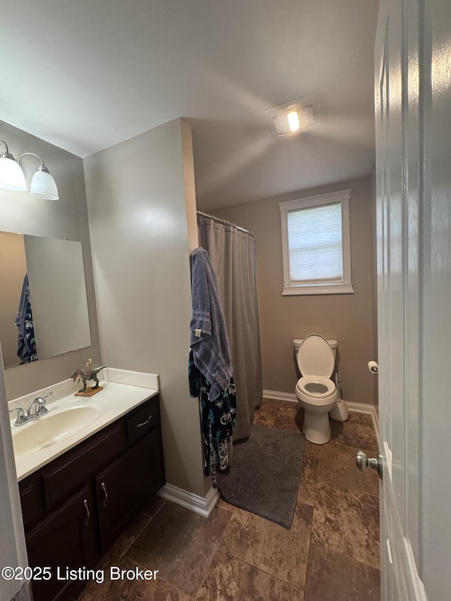 1103 Foxfire Rd, Bardstown, KY 40004 - full bathroom featuring toilet, vanity, baseboards, and a shower with shower curtain