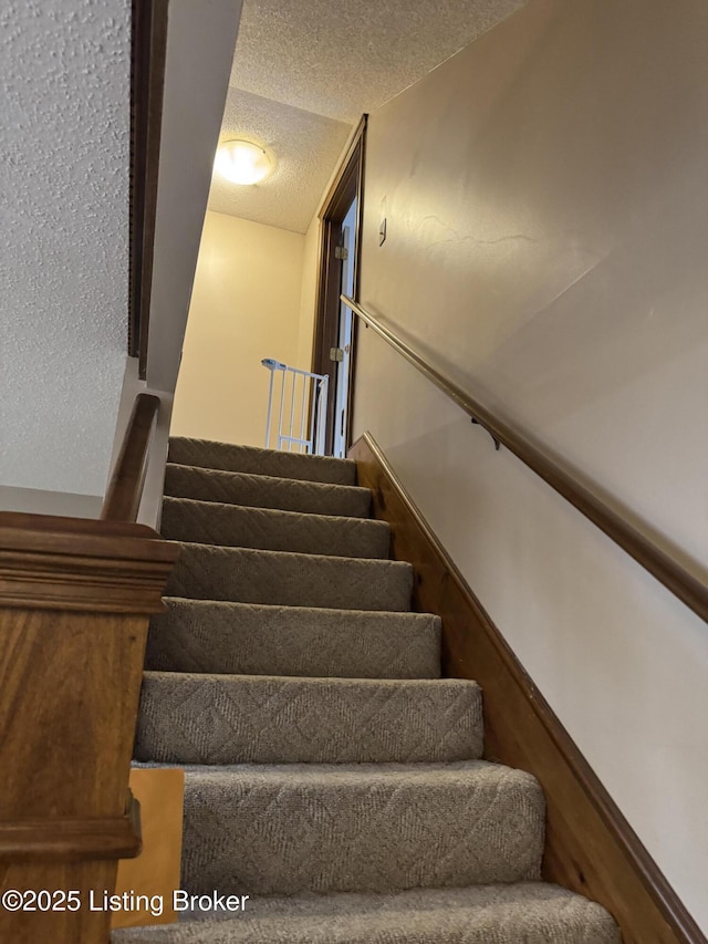 1103 Foxfire Rd, Bardstown, KY 40004 - staircase featuring a textured ceiling