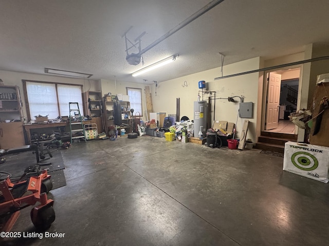1103 Foxfire Rd, Bardstown, KY 40004 - garage with water heater, a workshop area, and electric panel