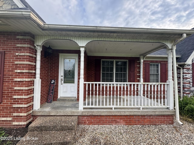 1103 Foxfire Rd, Bardstown, KY 40004 - doorway to property featuring a porch and brick siding
