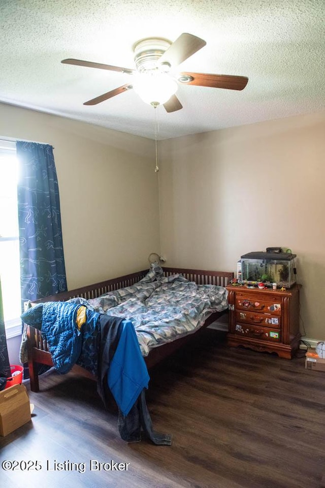 1103 Foxfire Rd, Bardstown, KY 40004 - bedroom with multiple windows, wood finished floors, and a ceiling fan