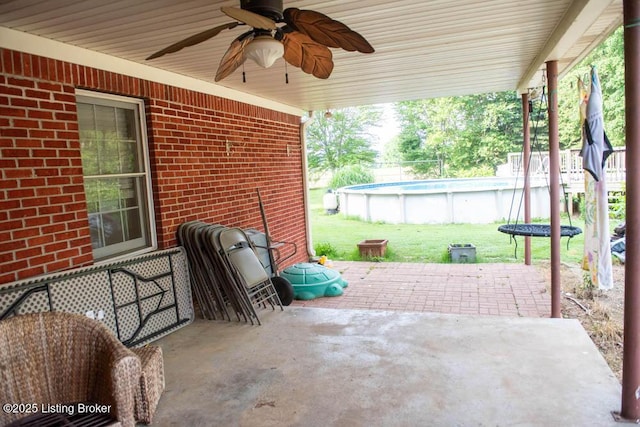 1103 Foxfire Rd, Bardstown, KY 40004 - view of patio with a ceiling fan and an outdoor pool