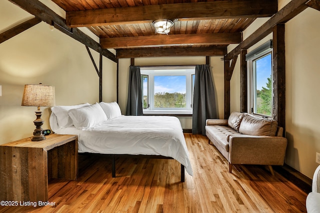 1416 Taylor Wood Rd, Simpsonville, KY 40067 - bedroom with multiple windows, light wood finished floors, and a wooden ceiling with exposed beams