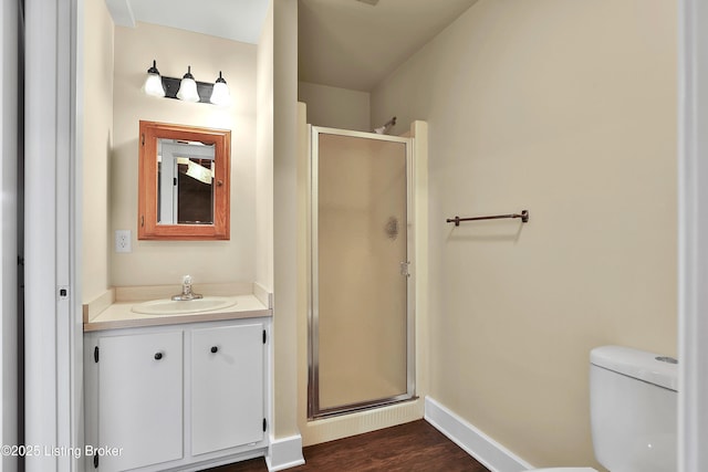 1416 Taylor Wood Rd, Simpsonville, KY 40067 - full bath featuring a shower stall, vanity, and wood finished floors