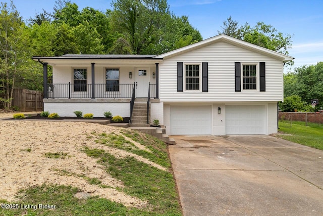 4205 Cottagehill Rd, Louisville, KY 40299 - view of front of property with an attached garage, covered porch, concrete driveway, and brick siding