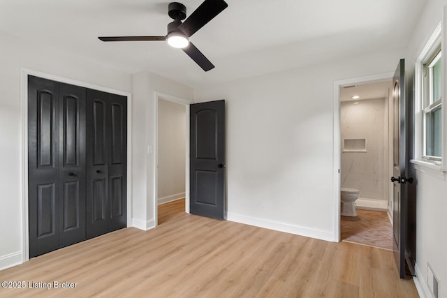 4205 Cottagehill Rd, Louisville, KY 40299 - unfurnished bedroom with light wood-style flooring, a closet, baseboards, connected bathroom, and ceiling fan