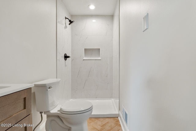 4205 Cottagehill Rd, Louisville, KY 40299 - bathroom featuring toilet, vanity, a marble finish shower, and recessed lighting