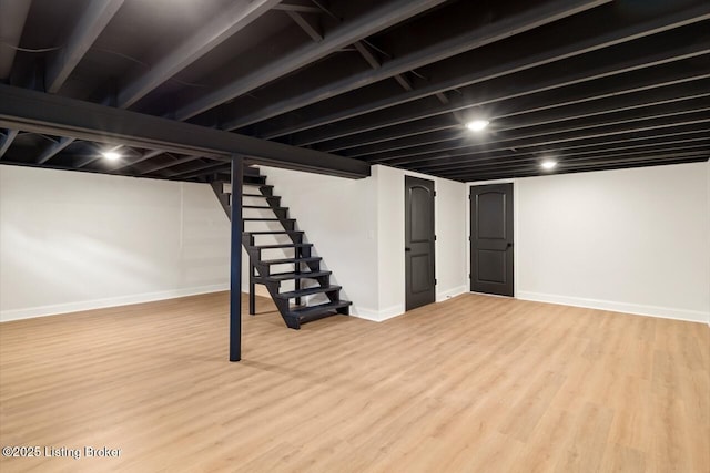 4205 Cottagehill Rd, Louisville, KY 40299 - finished below grade area featuring baseboards, wood finished floors, and stairs