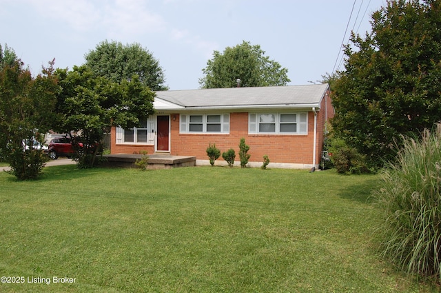 9530 Maple Rd, Louisville, KY 40229 - single story home with brick siding and a front lawn