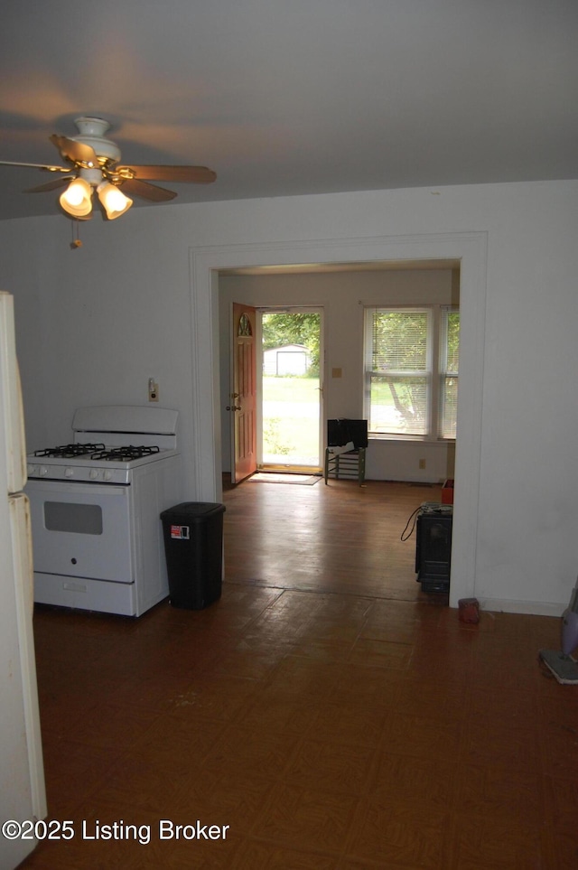 9530 Maple Rd, Louisville, KY 40229 - kitchen with white appliances and ceiling fan