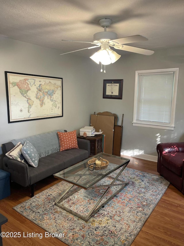 2623 Parklawn Dr, Louisville, KY 40217 - living room featuring wood finished floors, ceiling fan, and baseboards