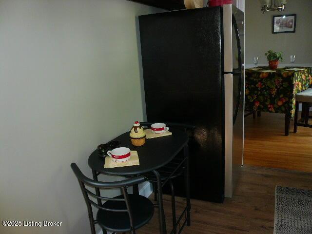1411 Falcon Dr, Louisville, KY 40213 - dining space with wood finished floors and a chandelier