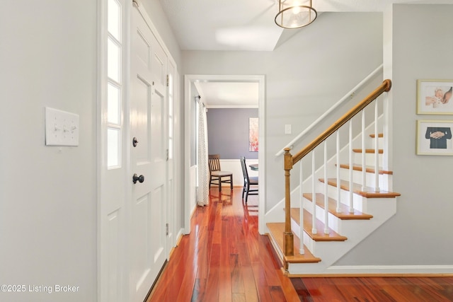 828 Dorsey Ln, Louisville, KY 40223 - entrance foyer featuring wood finished floors, stairway, and baseboards