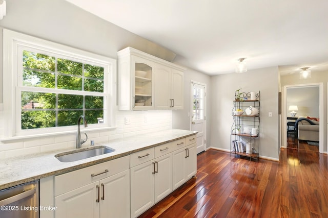 828 Dorsey Ln, Louisville, KY 40223 - kitchen featuring a sink, white cabinets, light stone counters, and backsplash