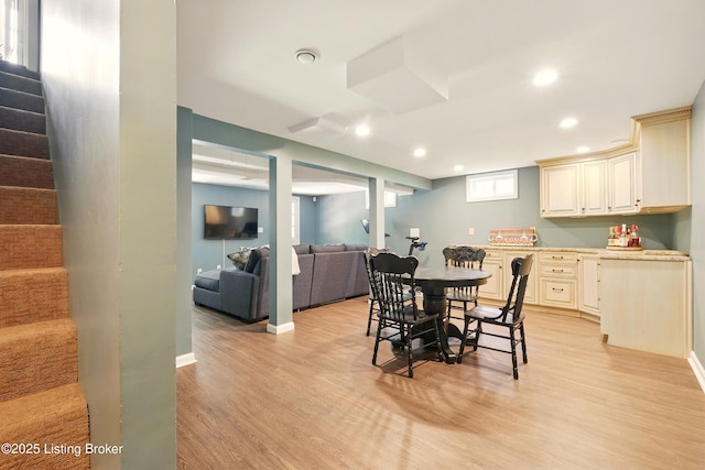 828 Dorsey Ln, Louisville, KY 40223 - dining room with light wood-style floors, stairs, recessed lighting, and baseboards