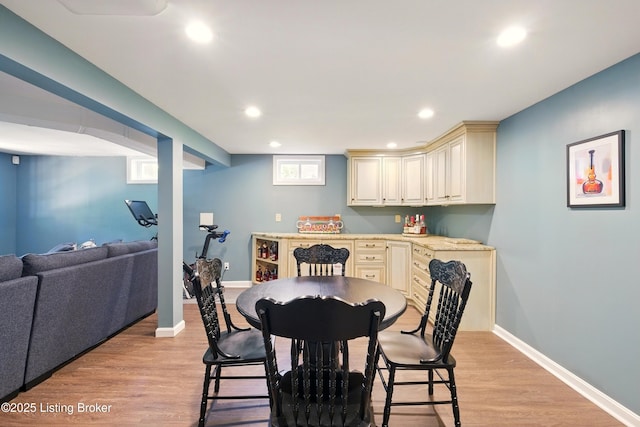 828 Dorsey Ln, Louisville, KY 40223 - dining area with light wood finished floors, recessed lighting, and baseboards