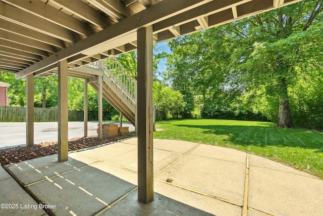 828 Dorsey Ln, Louisville, KY 40223 - view of patio / terrace with stairway and view of wooded area