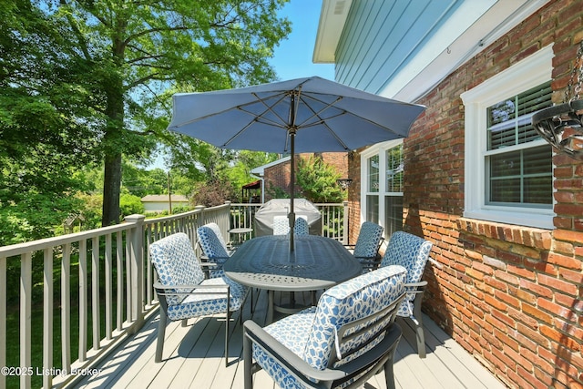 828 Dorsey Ln, Louisville, KY 40223 - wooden terrace with outdoor dining area and area for grilling