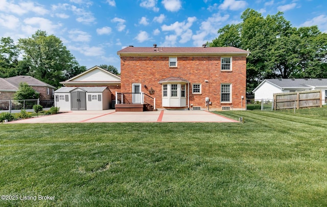 1311 Pollitt Ct, Louisville, KY 40223 - rear view of house featuring a patio and brick siding