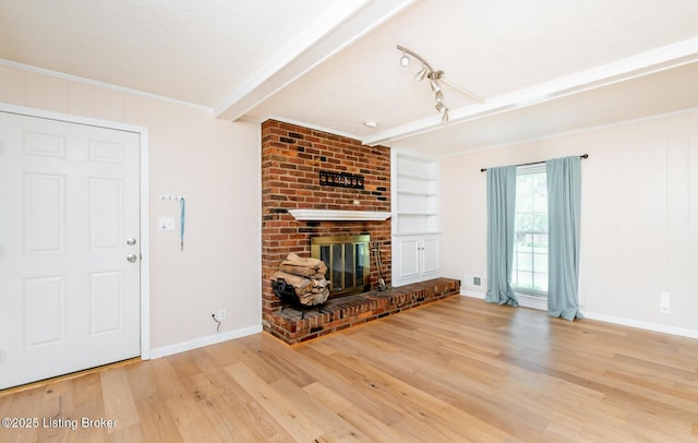 1311 Pollitt Ct, Louisville, KY 40223 - unfurnished living room featuring wood finished floors, a fireplace, baseboards, and built in features