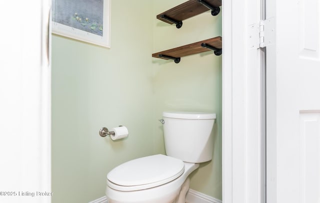 1311 Pollitt Ct, Louisville, KY 40223 - bathroom with toilet and baseboards