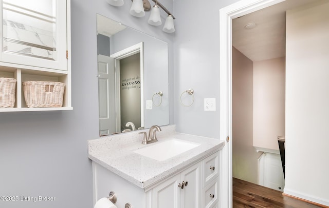 1311 Pollitt Ct, Louisville, KY 40223 - bathroom with vanity and wood finished floors