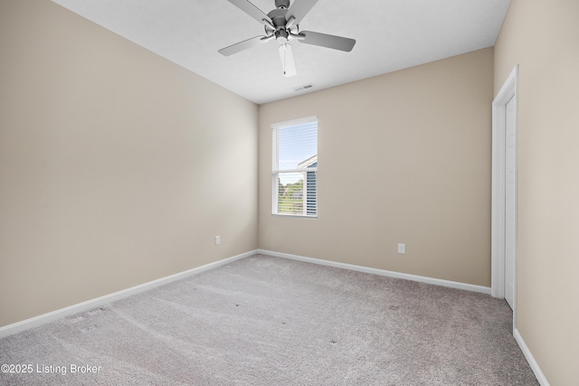 10516 Vista View Dr, Louisville, KY 40291 - unfurnished room featuring light colored carpet, baseboards, and ceiling fan